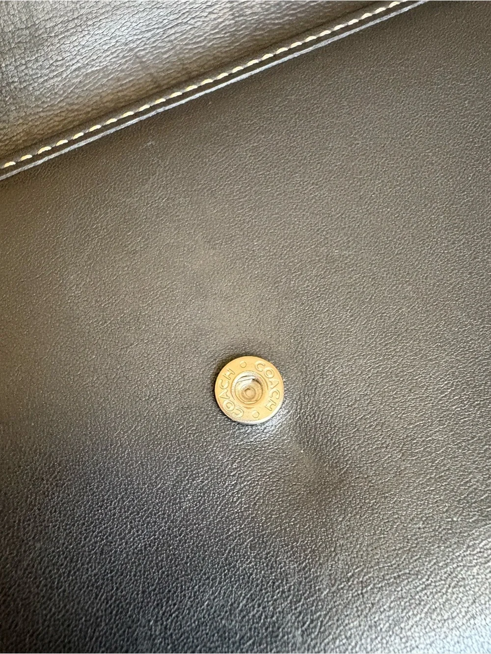 Coach features brand